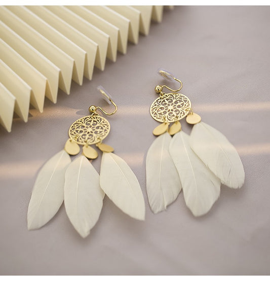 Clip on earrings - bohemian style white feather and golden geometric shape