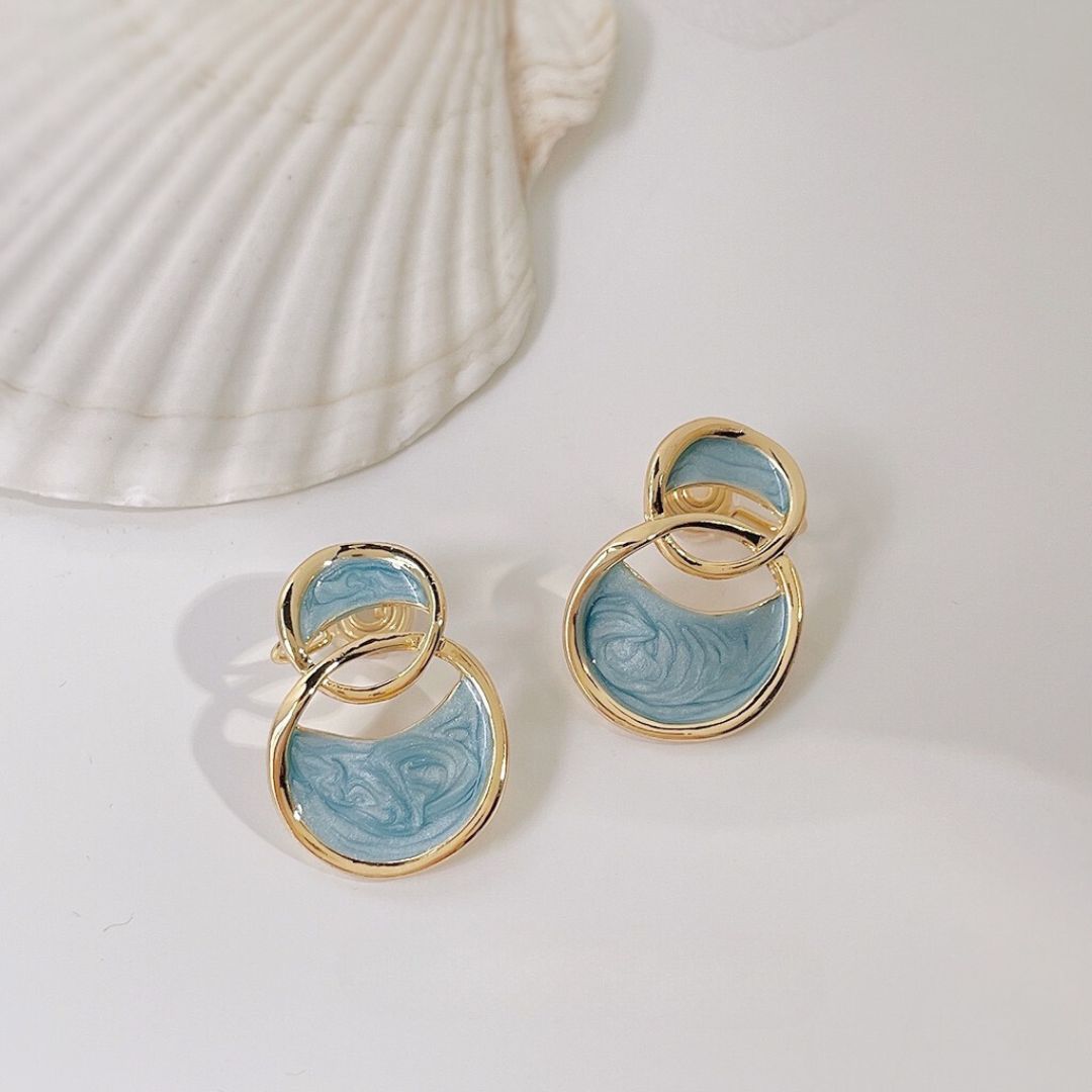 Clip on earrings - dripping enamel blue circle shape