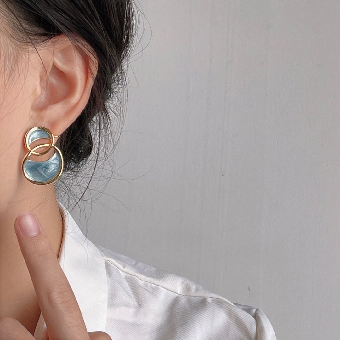 Clip on earrings - dripping enamel blue circle shape